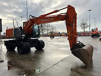Hitachi - 2012 - zx145w-3 - banden graafmachine - afbeelding 23 van  47