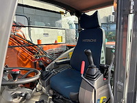 Hitachi - 2012 - zx145w-3 - banden graafmachine - afbeelding 35 van  47