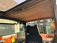 Hitachi - 2012 - zx145w-3 - banden graafmachine - afbeelding 36 van  47