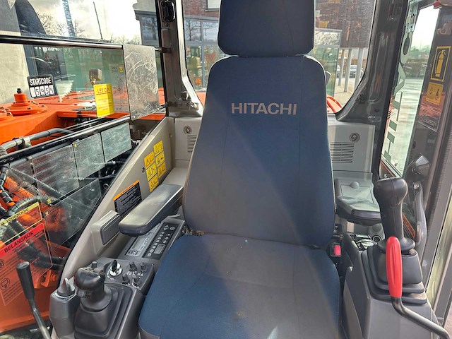 Hitachi - 2012 - zx145w-3 - banden graafmachine - afbeelding 37 van  47