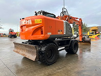 Hitachi - 2012 - zx145w-3 - banden graafmachine - afbeelding 34 van  47