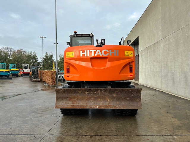 Hitachi - 2012 - zx145w-3 - banden graafmachine - afbeelding 43 van  47