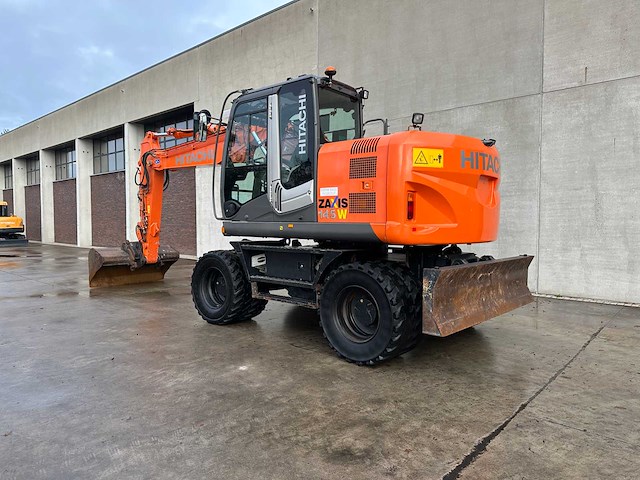 Hitachi - 2012 - zx145w-3 - banden graafmachine - afbeelding 44 van  47