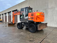 Hitachi - 2012 - zx145w-3 - banden graafmachine - afbeelding 44 van  47