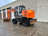 Hitachi - 2012 - zx145w-3 - banden graafmachine - afbeelding 45 van  47