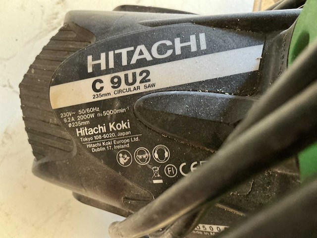 Hitachi afkortcirkelzaagmachine + slagmoersleutel (2x) - afbeelding 1 van  3