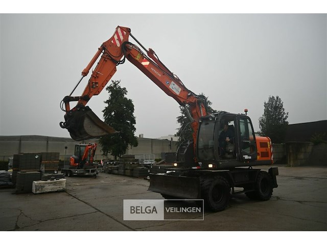 Hitachi zaxis 140w graafmachine - afbeelding 20 van  23