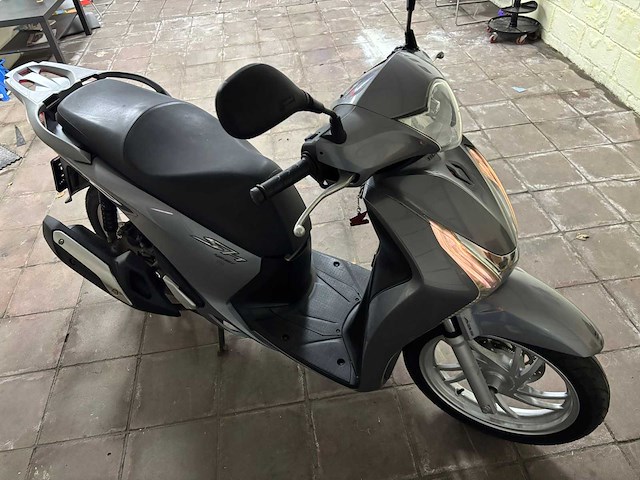 Honda sh 125i scooter - afbeelding 1 van  25