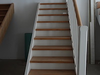 Houten toonzaal trap