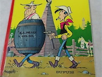 In de schaduw der boortorens - afbeelding 1 van  3