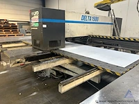 Industriële ponsmachine lvd delta 1500 met een vermogen van 36 kw en een maximale ponskracht van 200 kn. de machine werkt op 400 v en heeft bouwjaar 2001