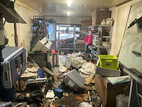 Inhoud container buiten - afbeelding 12 van  21