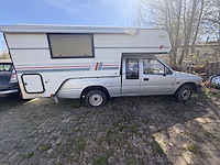 Isuzu 2500 diesel met tischer camper opbouw - afbeelding 7 van  14