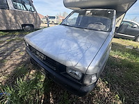 Isuzu 2500 diesel met tischer camper opbouw - afbeelding 11 van  14