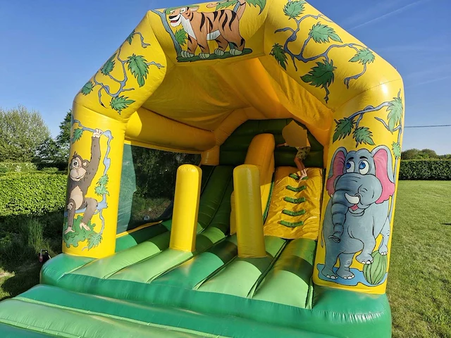 Jungle slide 6m x 4,5m inclusief blower springkasteel - afbeelding 1 van  2