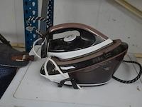 Keukenrobot domo , elektrisch snijmachine primo as 2-c, koffiezetmachine philips hd7765, naaimachine medion md17187, grill solis typ814, stomer karcher sc3 deluxe (niet compleet), stoomgenerator calor sv7040 (alles niet getest) - afbeelding 21 van  24
