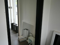 Kipdeur met rolluik h215xb97 cm - afbeelding 1 van  4