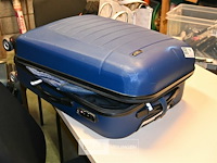 Koffer + partij rugzakken