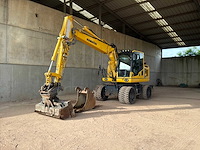 Komatsu - pw 148-10 - wheeled excavator - 2014 - afbeelding 1 van  24