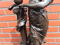 Koppel gespiegelde bronzen beelden - afbeelding 4 van  12