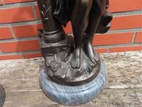 Koppel gespiegelde bronzen beelden - afbeelding 5 van  12