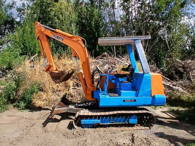 Kubota kh-033 rupsgraafmachine 3.3 ton - graafbak en dozerblad - afbeelding 11 van  18