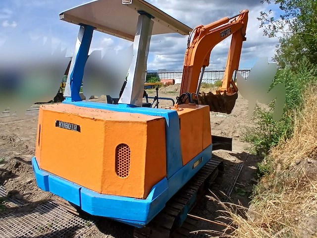 Kubota kh-033 rupsgraafmachine 3.3 ton - graafbak en dozerblad - afbeelding 13 van  18