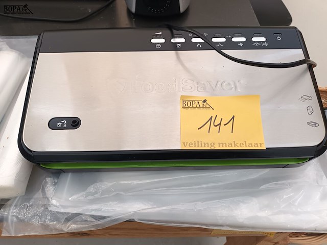 Lot 141 - vacuümmachine en folie - afbeelding 1 van  5