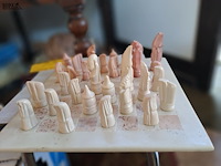 Lot 33 - vintage handgensneden afrikaans schaakspel uit natuursteen - afbeelding 2 van  2