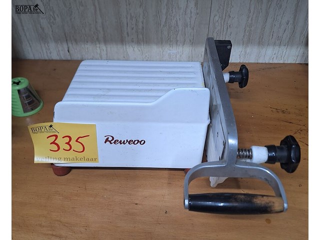 Lot 335 - kaassnijmachine reweoo - afbeelding 1 van  1
