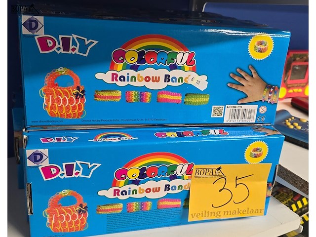 Lot 35 - colorfull rainbow bands nieuw 11 dozen - afbeelding 1 van  3