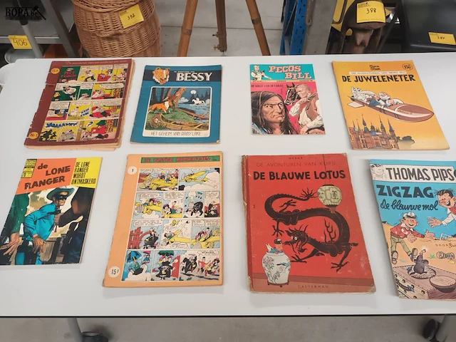 Lot 385 - strips. 8 stuks - afbeelding 1 van  7
