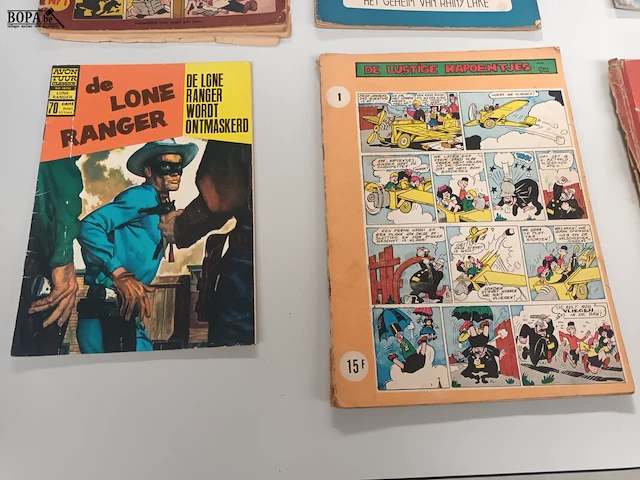 Lot 385 - strips. 8 stuks - afbeelding 6 van  7