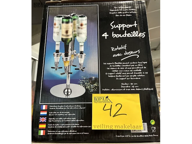 Lot 42 - roterende drankflessenhouder - afbeelding 1 van  2