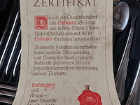 Lot 48 - bestekset solingen met certificaat compleet - afbeelding 2 van  4