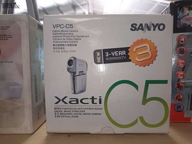 Lot 54 - digitale camera’s en statief. 4 stuks - afbeelding 7 van  7