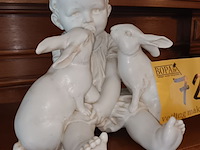 Lot 72 - porselein beeldje baby met konijnen - afbeelding 2 van  5