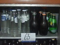 Lot flessen water en bier, waaronder spa, perrier, duvel, grimbergen, lindemans, bronzen baron - afbeelding 2 van  4