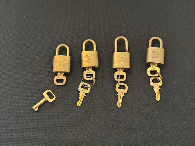 Louis vuitton slotjes (4x) - afbeelding 1 van  2