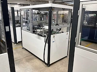 Machine voor assemblage mondmaskers