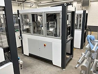 Machine voor assemblage mondmaskers