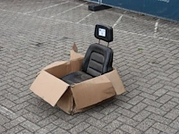 Machinestoel met hoofdstuen