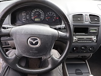 Mazda 323f - jmzbj143231520538 - 2003 - afbeelding 8 van  26