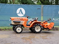 Minitractor kubota b1200dt diesel 12pk met grondfrees - afbeelding 1 van  1