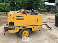 Mobiele compressor met zware breekhamer