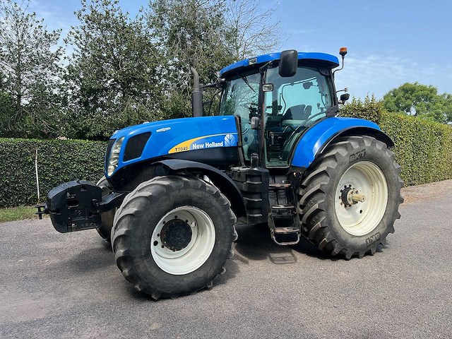 New holland - 2010 - t7040 4wd sa - vierwielaangedreven landbouwtractor - afbeelding 1 van  27