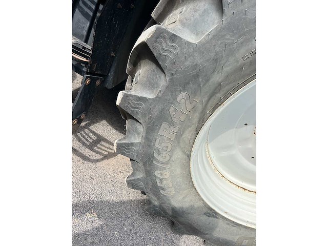 New holland - 2010 - t7040 4wd sa - vierwielaangedreven landbouwtractor - afbeelding 15 van  27