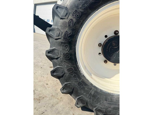 New holland - tvt135 - 4-wheel drive tractor - 2005 - afbeelding 21 van  21