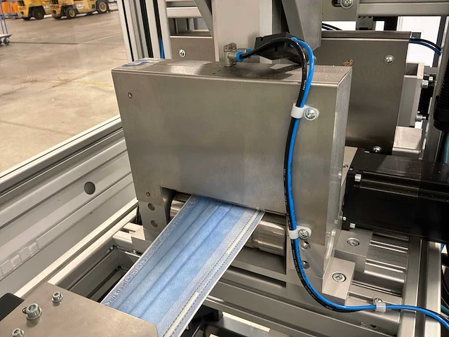 Nucleus machine voor assemblage mondmaskers - afbeelding 16 van  27