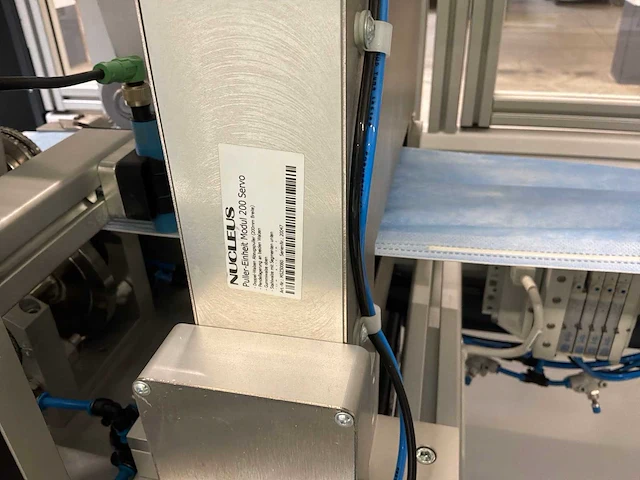 Nucleus machine voor assemblage mondmaskers - afbeelding 9 van  27